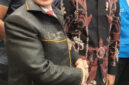 Presiden RI ke VII Ir. H. Joko Widodo menyalami Romo Asun Gautama di kongres ke XII Himpunan Mahasiswa Budhis Indonesia yang digelar di Mercure Convention Centre Ancol.