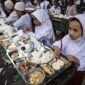 Ilustrasi: anak-anak sekolah makan siang gratis (Poto:istimewa)