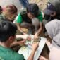 Dengan support IESR dan JK International, Generasi Energy Bersih (Gen-B) Lakukan Installasi Lampu PJU Tenaga Surya di kawasan wisata Bogor. (Foto: Istimewa)