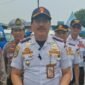 Kepala Terminal Kalideres, Revi Zulkarnaen saat menginformasikan soal rencana Kemenhub bakal meluncurkan aplikasi Terminal Online Sistem (TOS) berbasis digital. (Foto: Ifakta.co)
