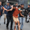 Tersangka Febriansyah dan Bustomy saat diamankan aparat kepolisian. (HO Humas Polres Jakbar)
